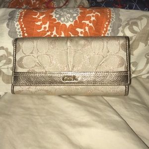 Authentic gold and tan coach wallet